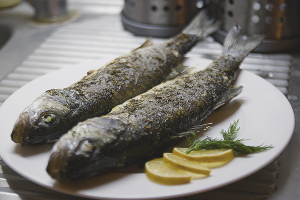 Como cocinar lubina en el horno